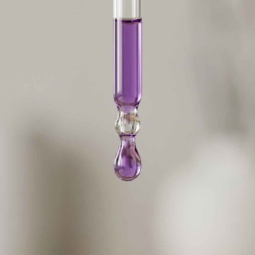 Close-up of purple liquid dropper containing niacinamide serum from SknMaxxing facial serum